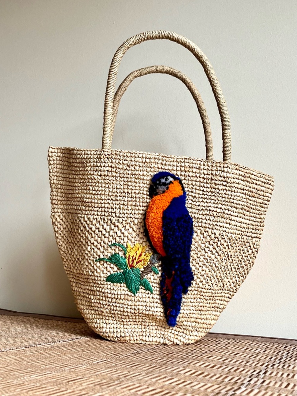 Handmade Raffia Tote Bag with Blue & Orange Parrot Accent